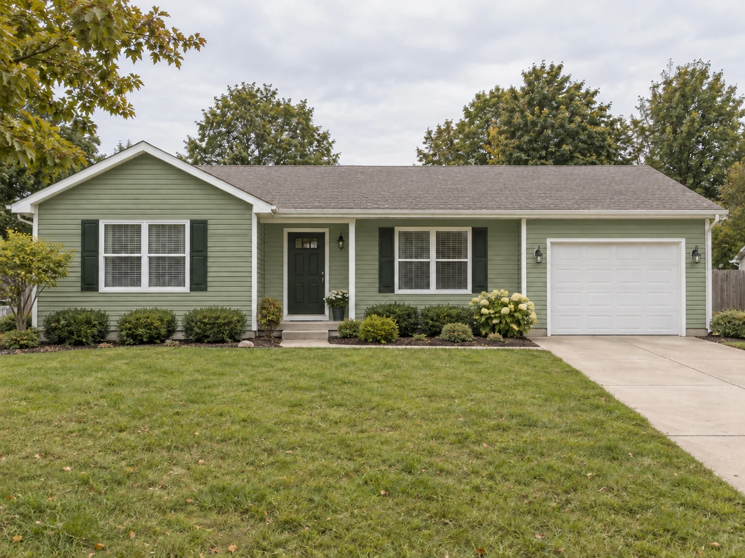 Sage Green Vinyl Siding on a Ranch House — After